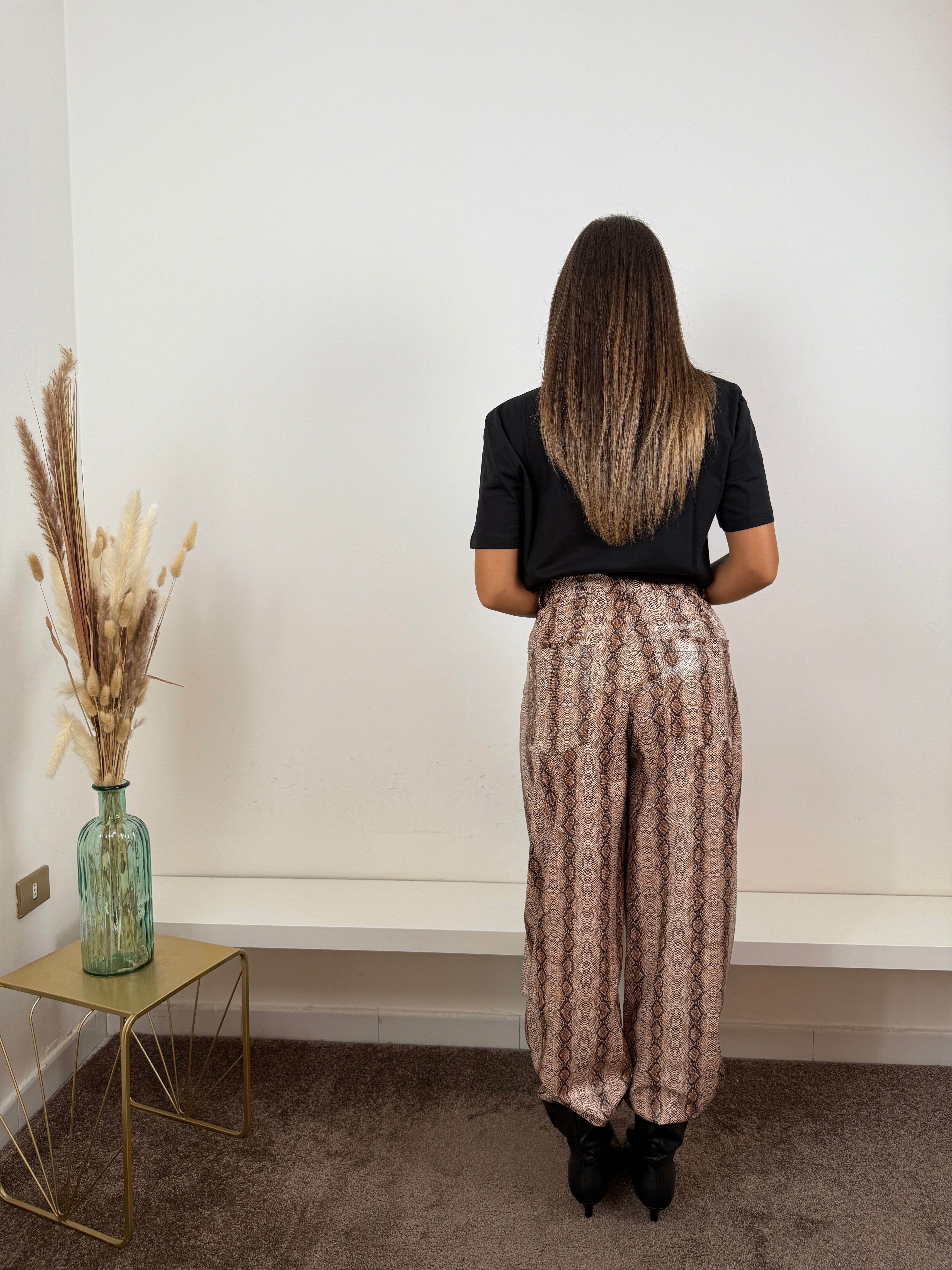 Pantaloni lumina ecopelle pitonati