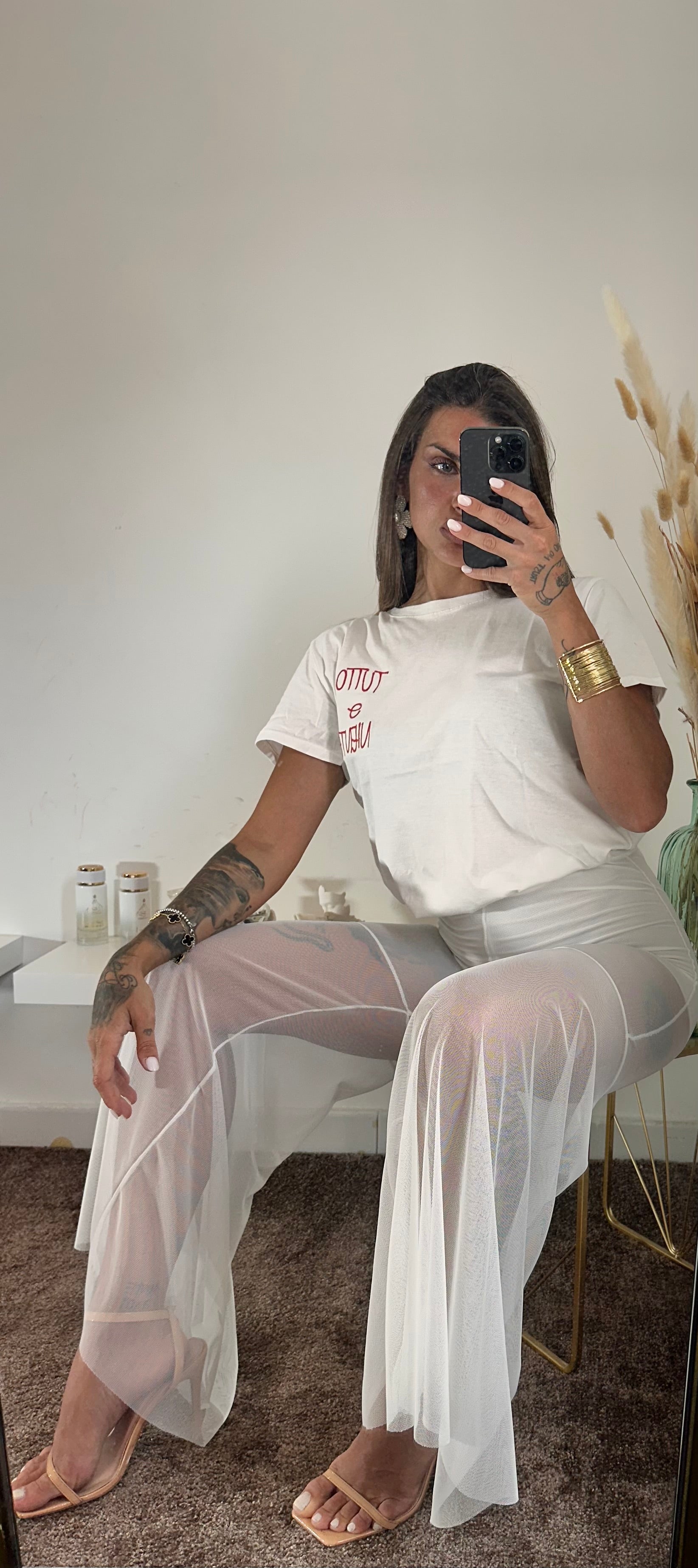 Pantalone bianco velato